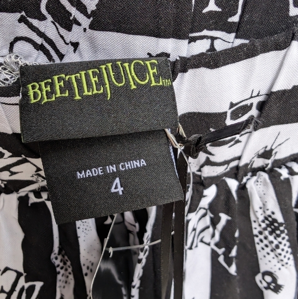 NWT Torrid Beetlejuice Skater Knee Length Skirt With Pockets Plus Size 4X - Picture 4 of 7